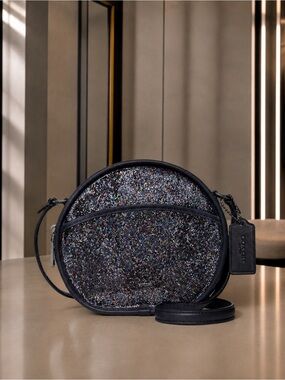 Like new! Auth Coach navy blue canteen glitter crossbody